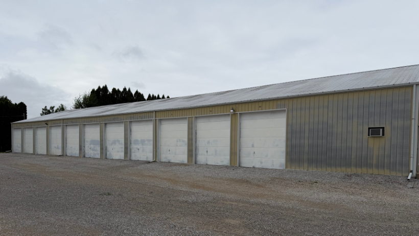 A row of drive-up storage units at Reid's Storage